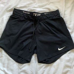 Black Nike Dri-Fit athletic shorts